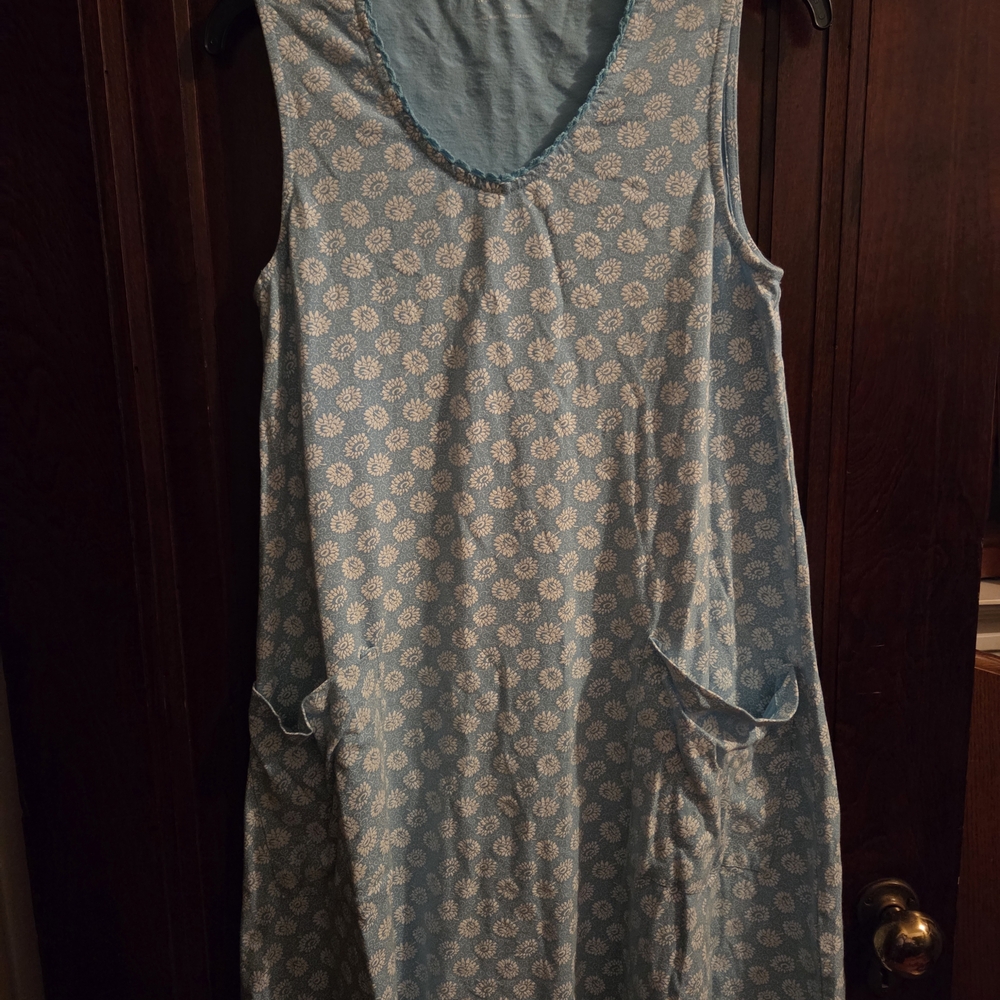 Blue Sleeveless Dress with White Floral Pattern